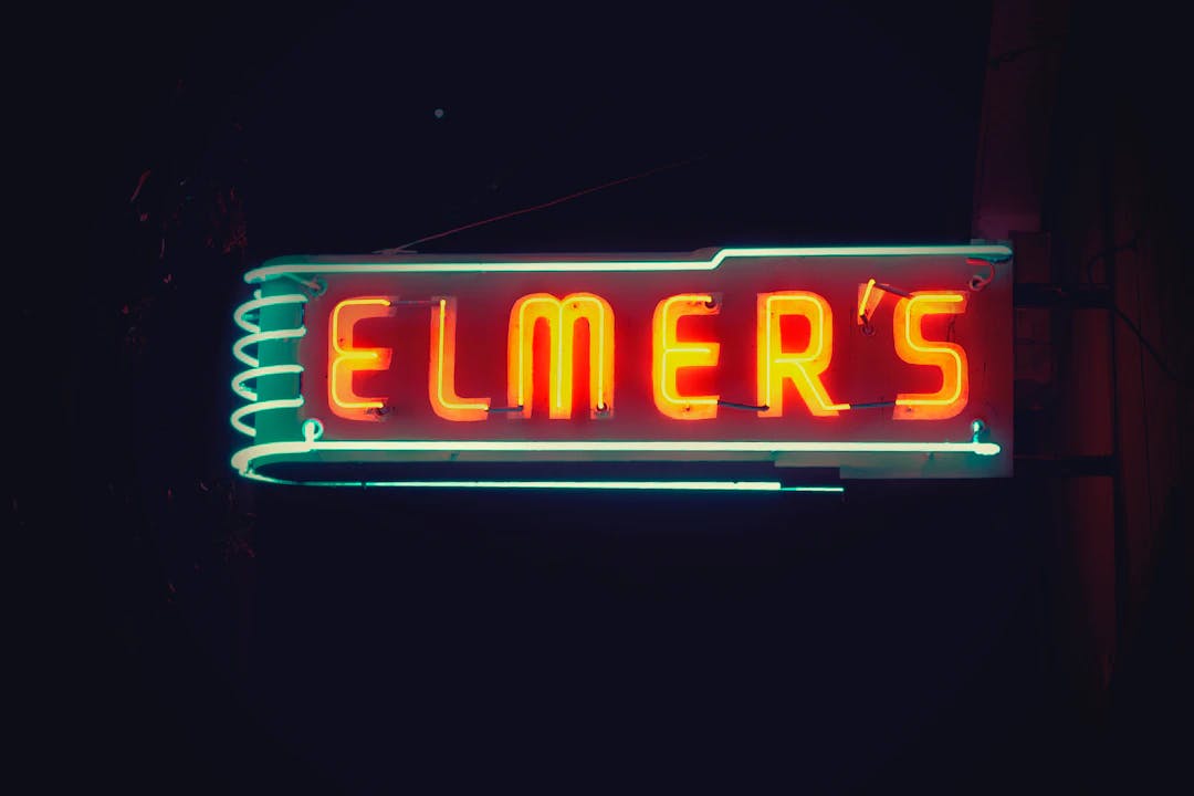 Elmer's neon light signage