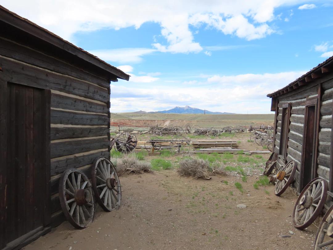 a couple of wooden buildings sitting next to each other