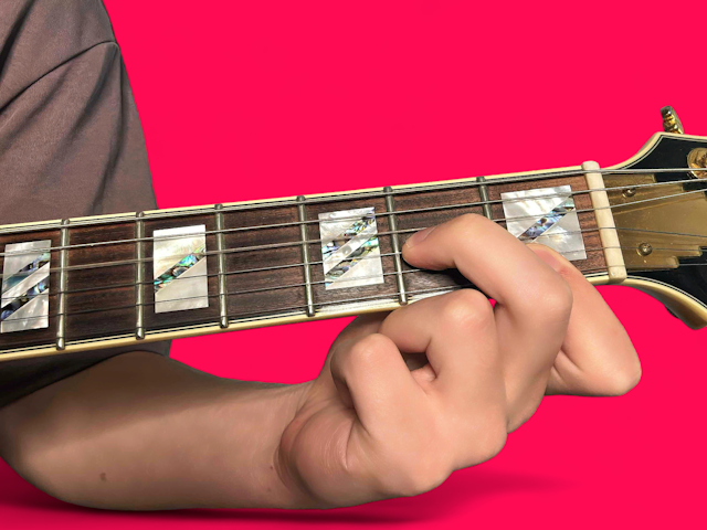 Dm7 guitar chord with finger positions