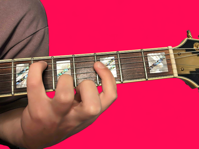 Ebmaj9 guitar chord with finger positions