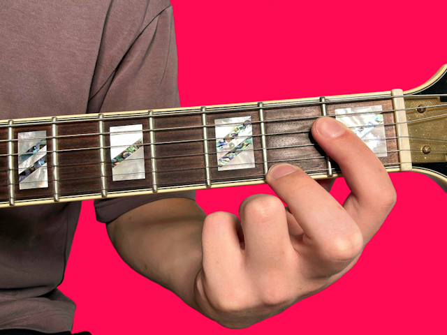 Ab7 guitar chord with finger positions