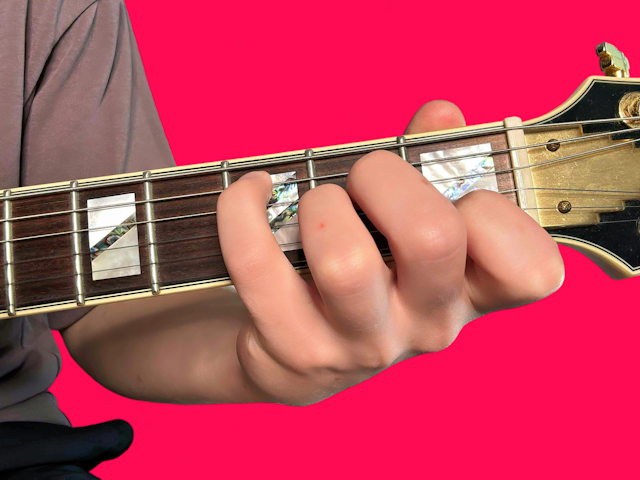 A minor over C guitar chord with finger positions