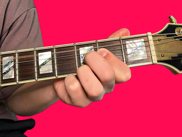 A7b9 guitar chord with finger positions