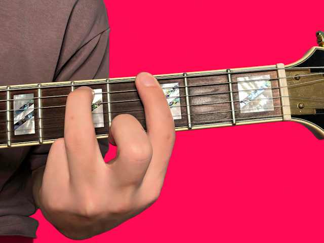 Gm7 guitar chord with finger positions