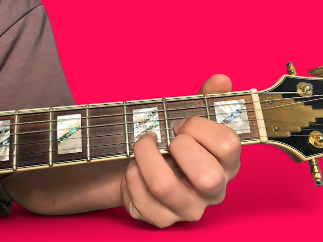 D major guitar chord with finger positions