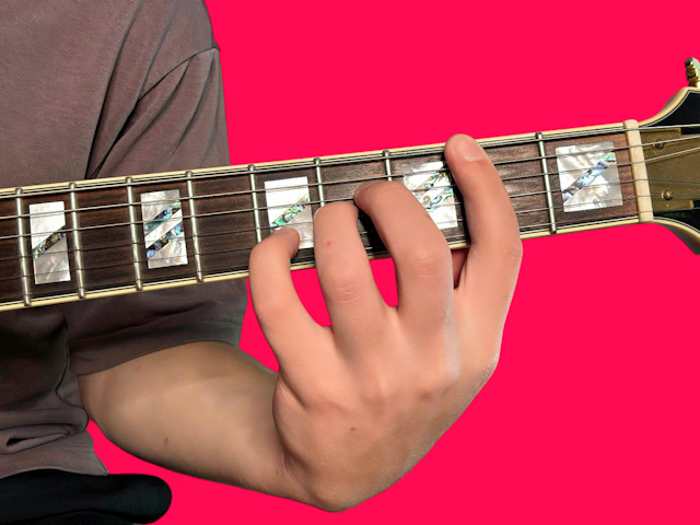 Bsus4 guitar chord with finger positions