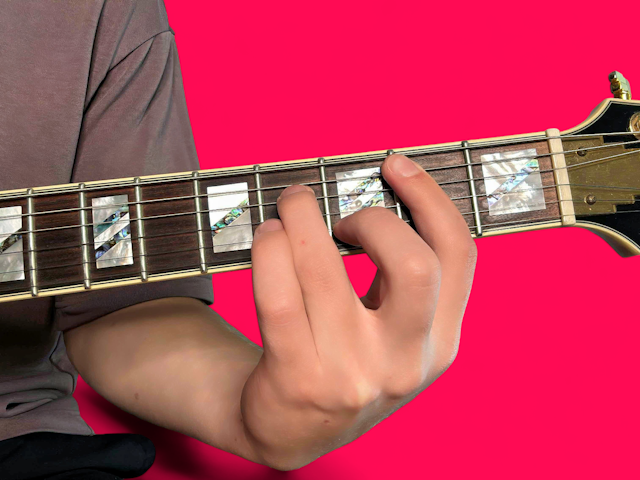 Bm7 guitar chord with finger positions