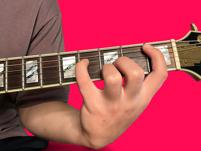 Bbaug guitar chord with finger positions