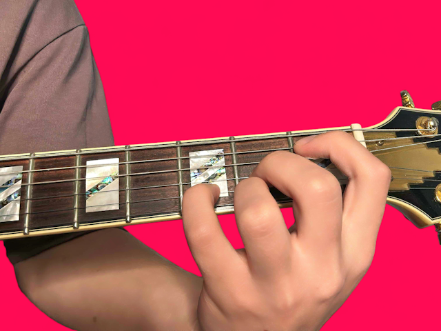 D major over Bb guitar chord with finger positions