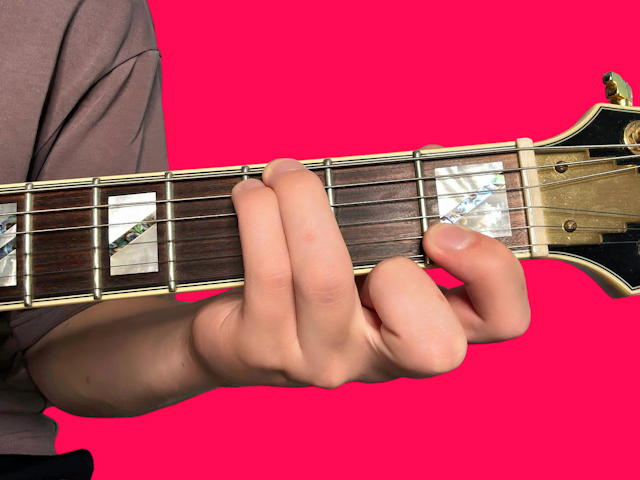 G7sus4 guitar chord with finger positions