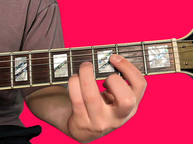 Amaj9 guitar chord with finger positions