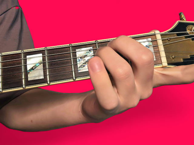 E7b9 guitar chord with finger positions