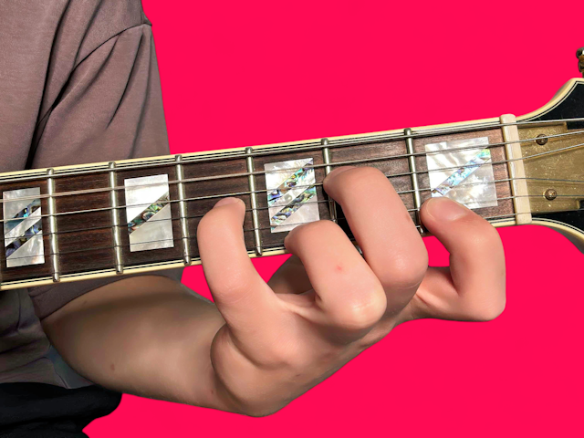Am9 guitar chord with finger positions