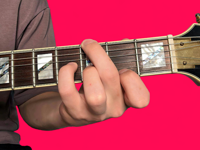 Gm7b5 guitar chord with finger positions
