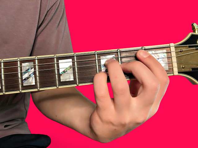 Bbmaj7 guitar chord with finger positions